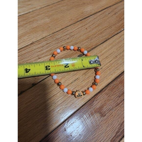 Handmade Orange and White Halloween Stretch Bracelet with Pumpkin - Picture 8 of 11